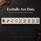 Eyeball Dots tiles 1 to 9 with blue corner numbers; the 1 Dot is an eyeball in a witch hat, on dark slate
