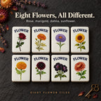 Eight flower tiles with different blooms including rose, marigold, sunflower and dahlia